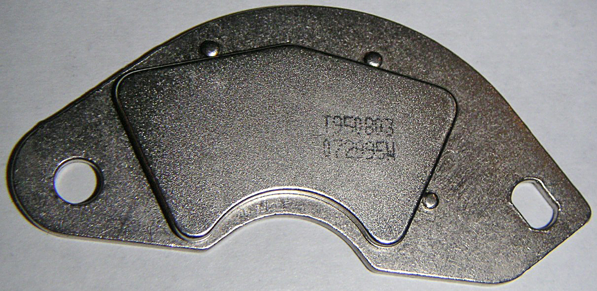 A neodymium magnet on a hard-drive bracket, photographed by Bloodshedder.